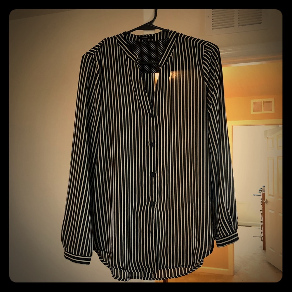 Striped black and white long sleeve work shirt.